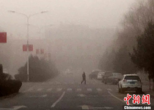 大范围沙尘天气侵袭甘肃河西走廊(图)