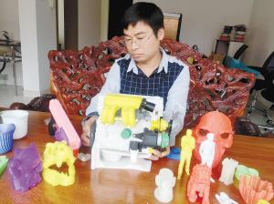 男子自制3D打印机单价2千以内 称“造梦机”(图)