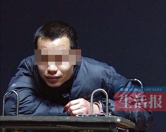 广西容县枪击案嫌犯被刑拘 杀人后现场改QQ签