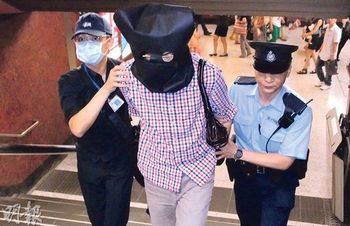 香港一男子打扮斯文 港铁非礼少女被拘捕(图)