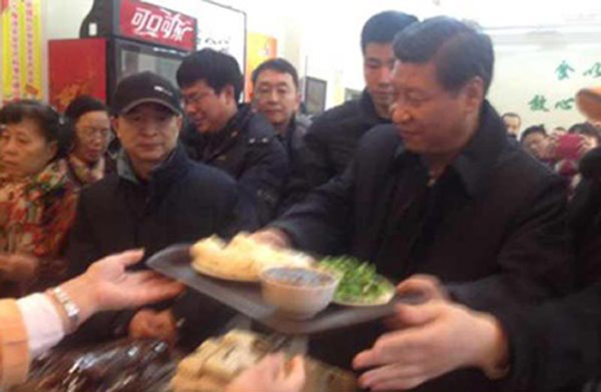 习近平买包子图片