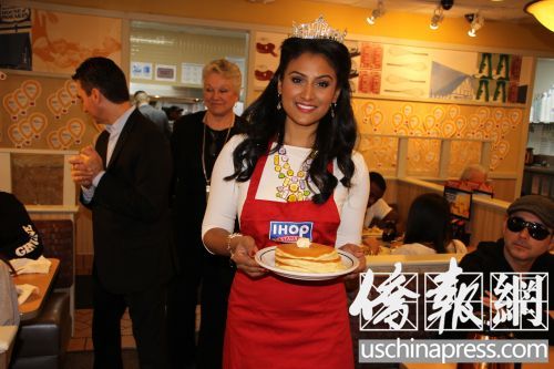 亚裔美国小姐参与全美薄煎饼日 餐馆做慈善(图