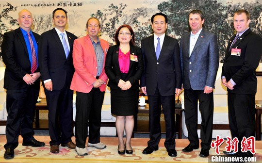 9月29日，中国国务院侨办副主任谭天星在北京会见了以孙晓明为团长的加中投资商会第二届市长访华团。中新社记者