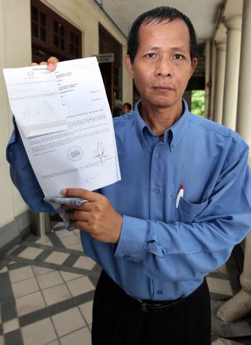 马华裔公务员申请脱离回教 官方向高庭提出反