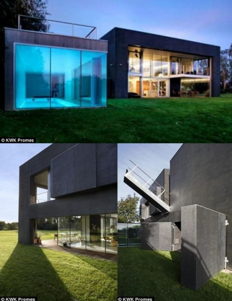 这栋"安全屋"设有落地玻璃窗,显得通透,但一旦关闭,只能通过二楼吊桥