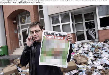 ��2011��11�£��������ܿ������򿯷�Ĭ��Ĭ����������־��İ칫���⵽ȼ�յ�Ϯ������ҳ��ͼ��