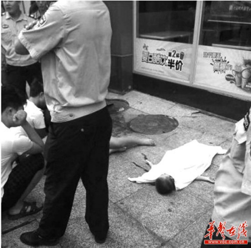 ����7��14�գ�¦����ˮ���в��нֿڣ�һ��4���׶���¥��׹���������ѹ�ͼ