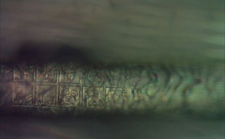 �˵�ͷ��ֱ��ԼΪ80΢�ף����ⲿ������ÿ��ͼ��ռ25΢�ף����ֻ�ܽ�����΢���Ķ���