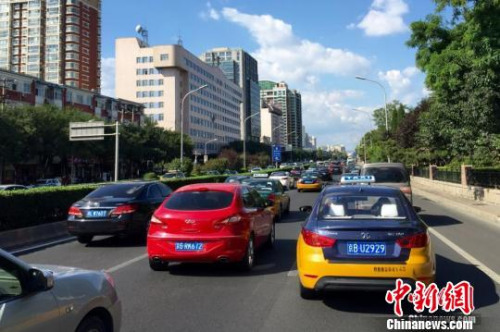 ����ͼ��9��11���������壬�����ٽ���ĩ��������ۻ�ȳ����������Ը������������գ������н�ͨί�������������У�������ȡ������ͨ��ʽ���С�ͼΪ�����ж����ֲ�������ʼӵ�¡�<a target='_blank' href='http://www.chinanews.com/' >������</a>���� ��˶ ��