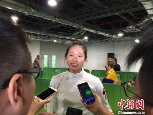 江旻憓赛后接受采访。 记者 卢岩 摄 江旻憓赛后接受采访。 记者 卢岩 摄