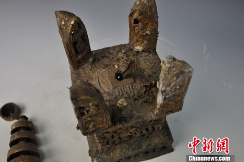 未经修复的铅贴金阿育王塔 受访者供图