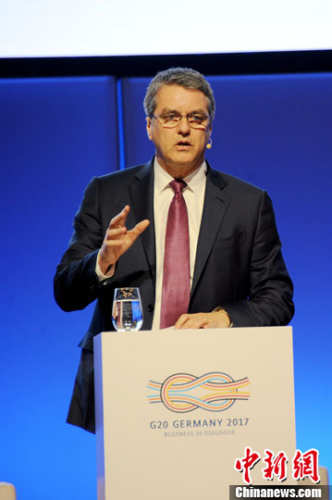 当地时间5月3日,世界贸易组织(WTO)总干事阿泽维多在柏林举行的二十国集团工商峰会(B20)上讲话。<a target='_blank' href='http://www.chinanews.com/'>中新社</a>记者 彭大伟 摄 当地时间5月3日,世界贸易组织(WTO)总干事阿泽维多在柏林举行的二十国集团工商峰会(B20)上讲话。<a target='_blank' href='http://www.chinanews.com/'>中新社</a>记者 彭大伟 摄