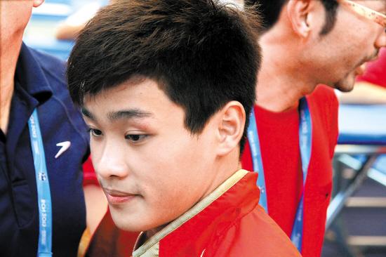 赛后,因为入水时水流的冲击,张雁全的眼角还有些红肿 汪晖 摄