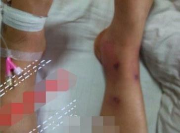 7��Ů���ڷ�ѧ·�ϱ�����Ϯ������(ͼ)