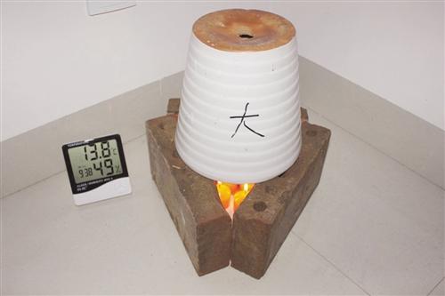 大学生用蜡烛花盆自制取暖神器 40分钟升温12.5℃
