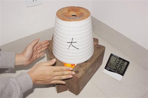 大学生用蜡烛花盆自制取暖神器 40分钟升温12.5℃