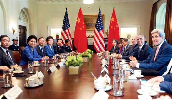 p54 美国总统奥巴马当地时间6月24日下午在白宫会见出席新一轮中美战略与经济对话、人文交流高层磋商的中国代表团主要成员。图为中国国务院副总理刘延东、副总理汪洋、国务委员杨洁篪,美国副总统拜登、国务卿克里、财长雅各布·卢等在座。<a target='_blank' href='http://www.chinanews.com/'>中新社</a>