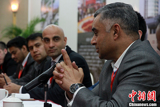 浙江义乌“两会”:外籍商客盼“服务”更国际化