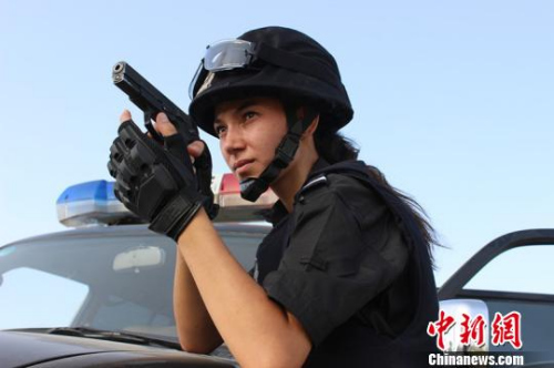新疆麦盖提县27岁的维吾尔族姑娘米日办·买买提明曾多次荣获模特比赛