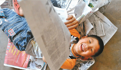 9岁神童没上过学不会说话 能读报识拼音(图)