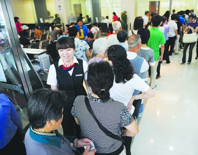 建党90周年纪念币兑换火爆 银行昨全部兑完