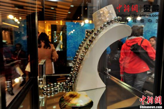 ��ý�۲��й�2011���50�ܣ���ע�й��ݳ�Ʒ