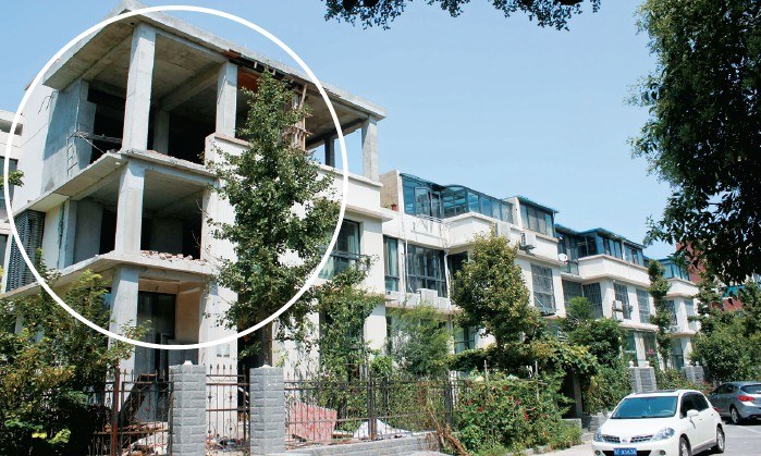 小区别墅违建"增肥"又"带帽" 城管:强拆(图)