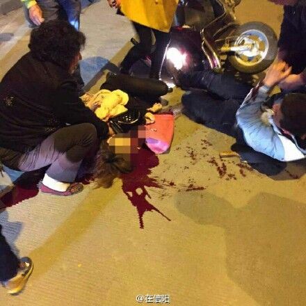 女子被飞车割喉死亡凶手被捕时面带微笑(图)