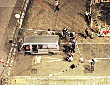 ����ϰ������Ů�Ӹ۴�ͽ��·�˺�ֹ�������ӣ�ͼ��