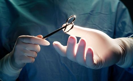 Ӣ�����˽����������ڱ���20���׳�����ǯ��ͼ��