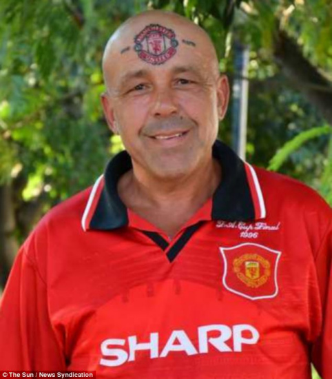 球迷将球队徽标纹脑门改名曼联家猫叫贝克汉姆