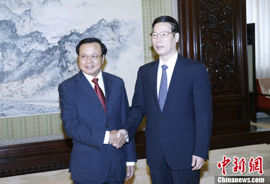 张高丽会见越共中央政治局委员范光毅