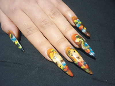 首位华裔获殊荣 大马林丽玲国际美甲赛夺冠(图)