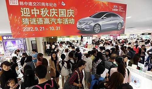 韩国免税店2013年销售火爆中国游客被记头功