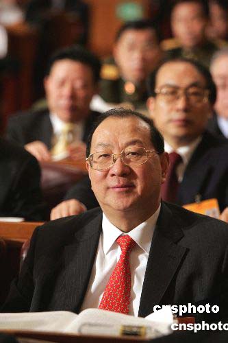 图财政部长金人庆出席十届全国人大三次会议