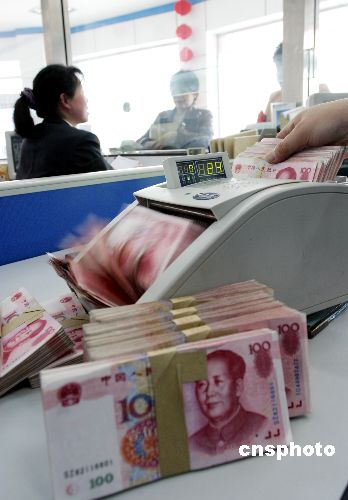 图人民币币值的重估有助于为中国经济过热降温