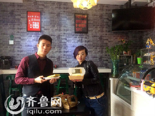 山东一80后夫妻北京卖菜煎饼吸引国内外消费者(图)