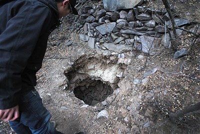 北京香山附近墓地被盗文物部门称墓葬不属文物