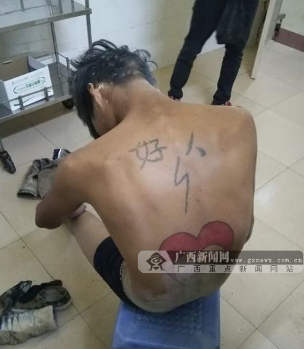 男子背部刺青“好人”三天连抢同一女子两次(图)