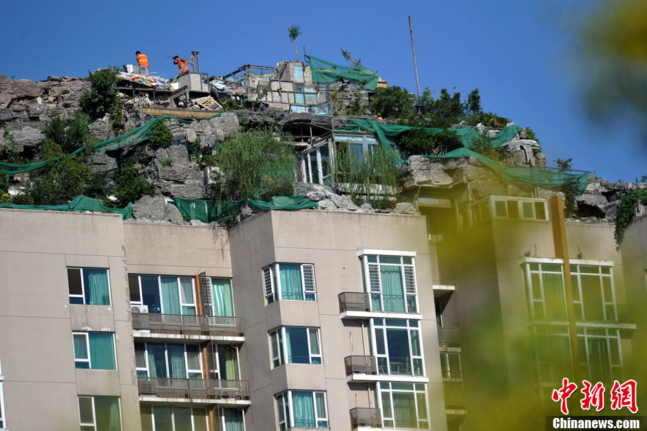 最牛楼顶别墅自拆大限已至山顶被削平