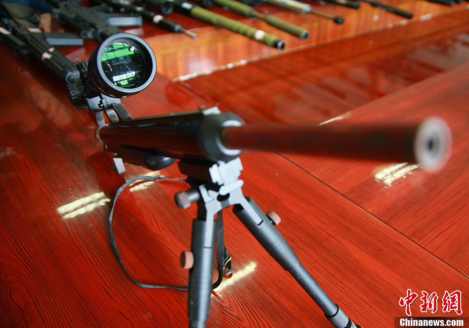 浙江警方破获公安部特大武装贩毒案缴获枪支43把