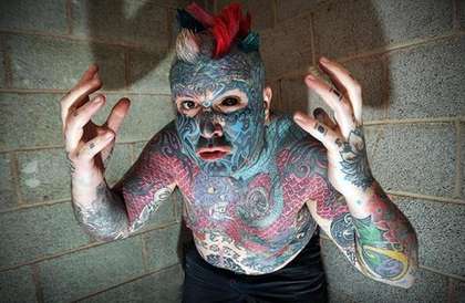 摔角手为刺青砸2万磅全身都是眼球也不放过(图)
