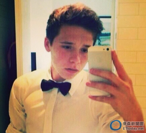 贝克汉姆培养儿子金钱观念让其兼职当服务员(图)