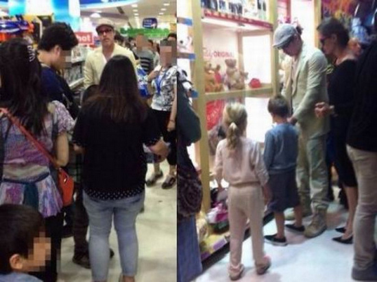 皮特与朱莉现身上海为子女买玩具遭民众围观(图)