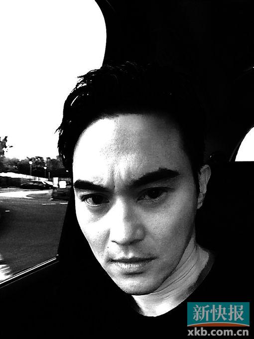 张智霖晒酷照 眼神犀利表情严肃(图)