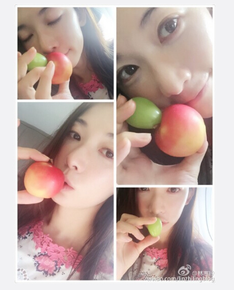 林志玲拿水果自拍娇羞亲吻小苹果(图)