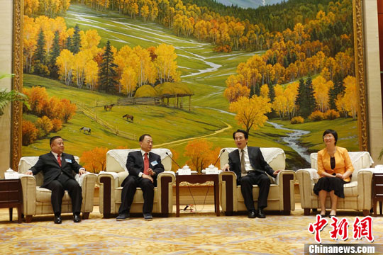 谭天星会见泰国中国和平统一促进会总会访问团